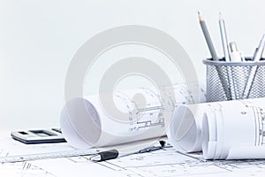 Architectural blueprint rolls and plans, engineering and office